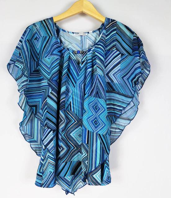 Nottion's blue geo print cape ruffled blouse